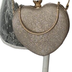 Source Unknown Gold Clutch with Heart-Shaped Design and Shimmering Fabric